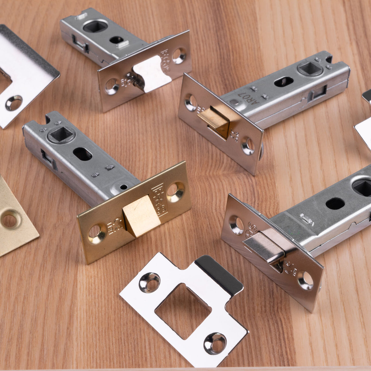 Image showing a range of tubular latches made by Carlisle Brass available to order from Trade Door Handles