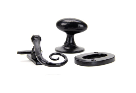 Image showing a Black mortice knob and window fastener made by From The Anvil.  Available to order from Trade Door Handles in Kendal