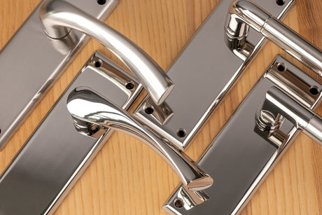 Carlisle Brass Latch Door Handles on Backplate