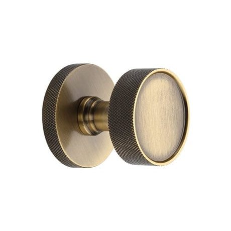 Heritage Brass Owen Knurled Knob on Knurled Concealed Base Antique Brass Finish