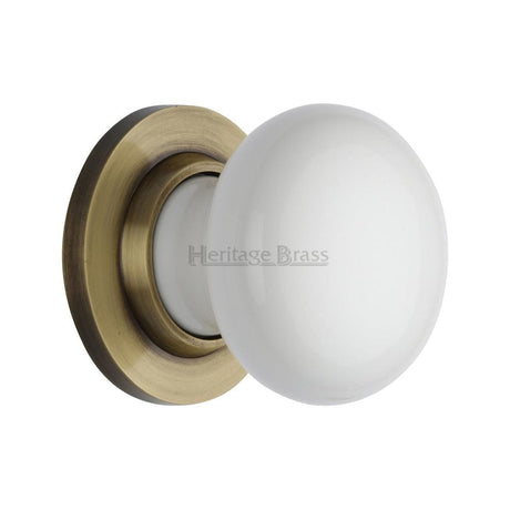 Heritage Brass White Knob with Antique Brass base
