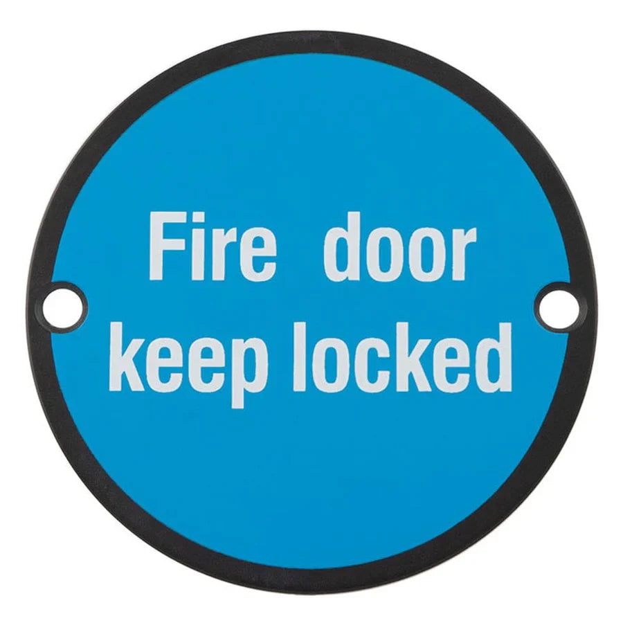 This is an image showing a safety sign for a commercial building readin"Fire door keep locked"