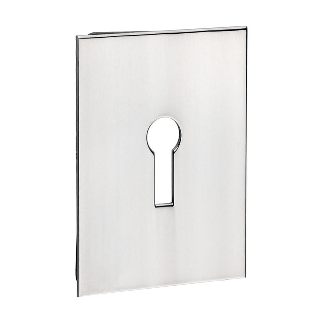 This is an image of Timco - Lock Profile Self-Adhesive Escutcheon - Oblong - Polished Stainless Steel 65 x 47 (1 Each Bag) 200027