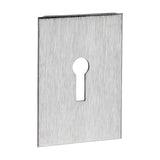This is an image of Timco - Lock Profile Self-Adhesive Escutcheon - Oblong - Satin Stainless Steel 65 x 47 (1 Each Bag) 200984