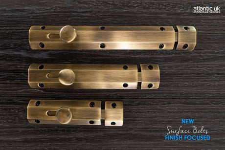 Quality image of Atlantic Solid Brass Surface Door Bolt 6" - Antique Brass | Sku. asb6ab | available from Trade Door Handles.