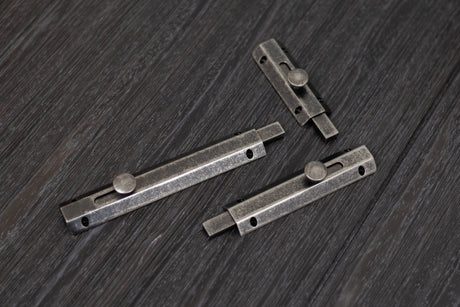 Quality image of Atlantic Solid Brass Surface Door Bolt 4" - Distressed Silver | Sku. asb4ds | available from Trade Door Handles.