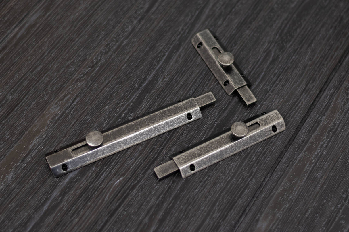 Quality image of Atlantic Solid Brass Surface Door Bolt 6" - Distressed Silver | Sku. asb6ds | available from Trade Door Handles.
