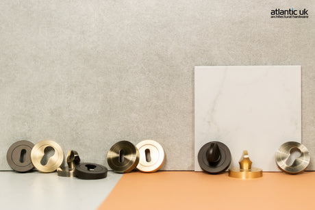 Quality image of STATUS Key Escutcheons on Round Rose - Urban Dark Bronze | Sku. s2esckrudb | available from Trade Door Handles.