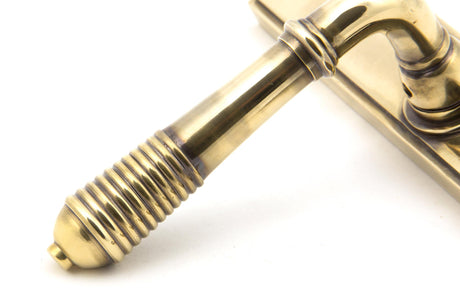 From The Anvil - Aged Brass Reeded Slimline Lever Espag. Lock Set | Sku. 33039 | Trade Door Handles.