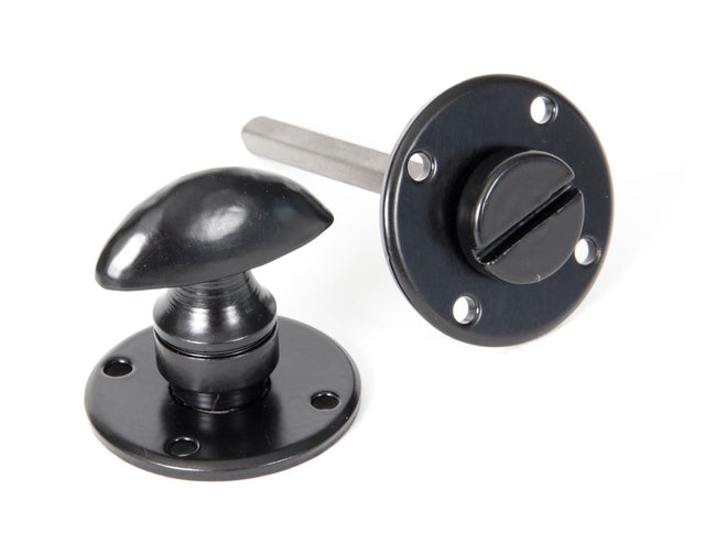 From The Anvil - Black Round Bathroom Thumbturn | Sku. 33382 | Trade Door Handles.