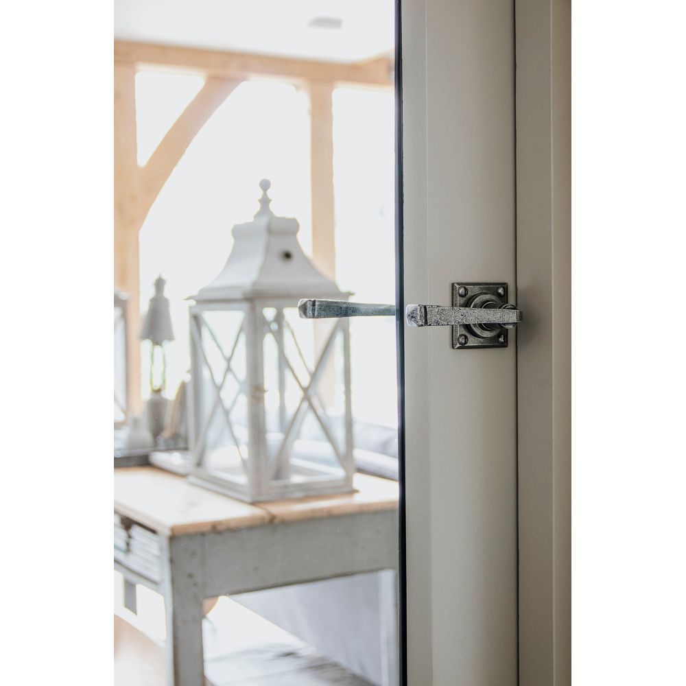 From The Anvil - Pewter Avon Lever on Rose Set Sprung | Sku. 33874/S | Trade Door Handles.