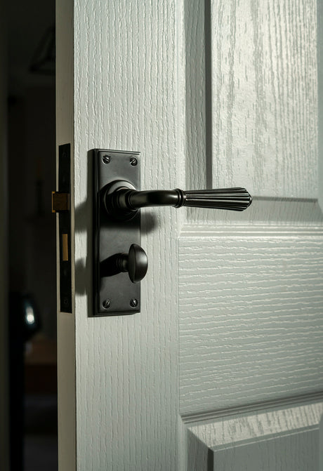From The Anvil - Aged Bronze Hinton Lever Bathroom Set | Sku. 45330 | Trade Door Handles.