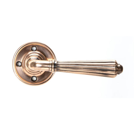 From The Anvil - Polished Bronze Hinton Lever on Rose Set | Sku. 45333 | Trade Door Handles.