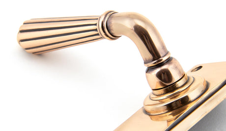 From The Anvil - Polished Bronze Hinton Lever Latch Set | Sku. 45335 | Trade Door Handles.