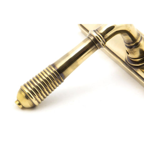 From The Anvil - Aged Brass Reeded Slimline Lever Espag. Latch Set | Sku. 45419 | Trade Door Handles.