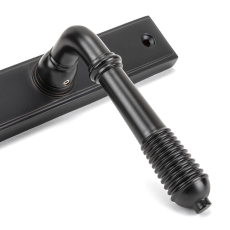 From The Anvil - Aged Bronze Reeded Slimline Lever Espag. Latch Set | Sku. 45427 | Trade Door Handles.