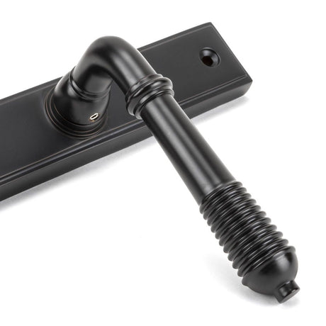 From The Anvil - Aged Bronze Reeded Slimline Lever Espag. Latch Set | Sku. 45427 | Trade Door Handles.
