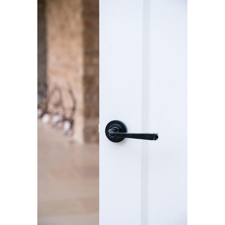 From The Anvil - Black Avon Round Lever on Rose Set (Plain) | Sku. 45623 | Trade Door Handles.