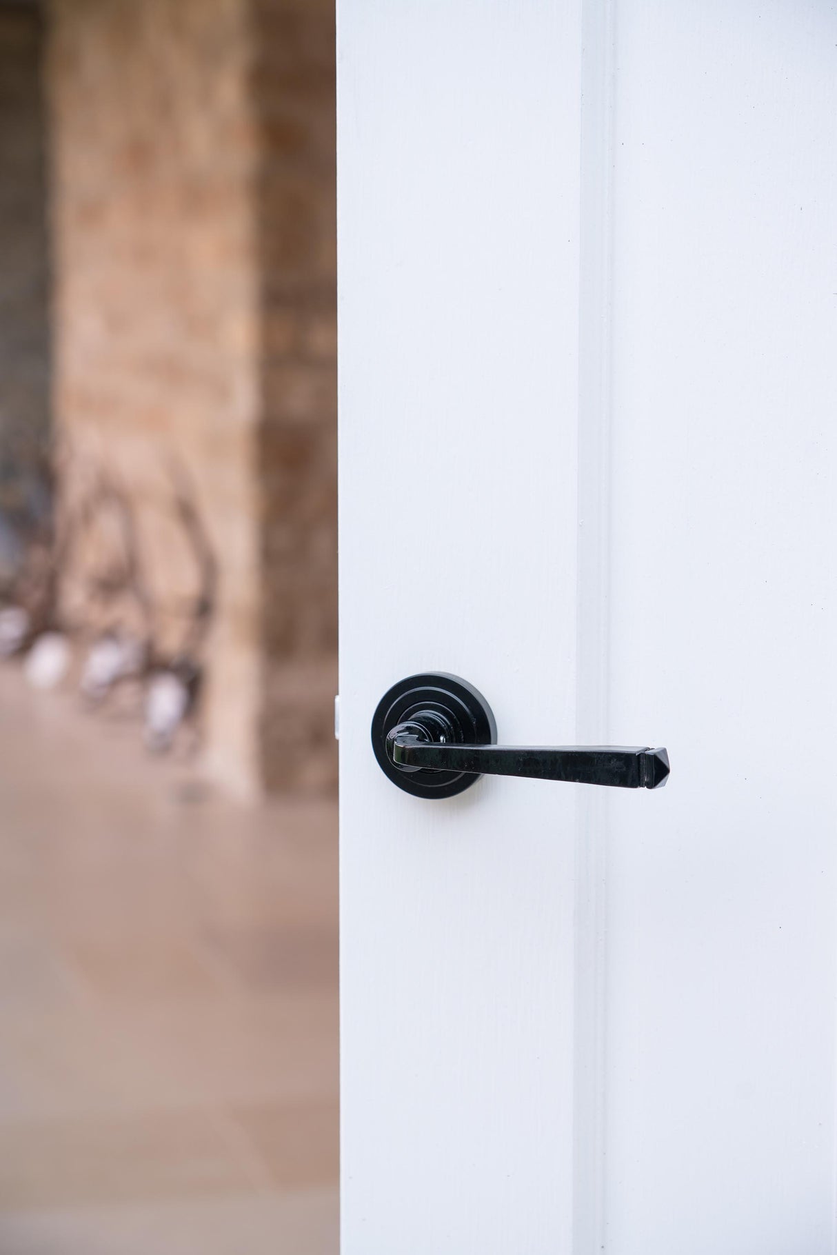 From The Anvil - Black Avon Round Lever on Rose Set (Art Deco) | Sku. 45624 | Trade Door Handles.