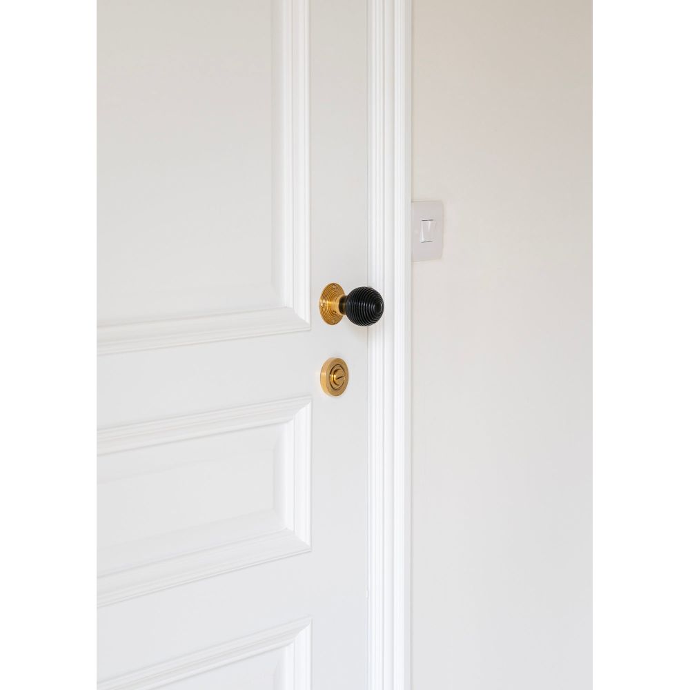 From The Anvil - Aged Brass Round Thumbturn Set (Plain) | Sku. 45731 | Trade Door Handles.