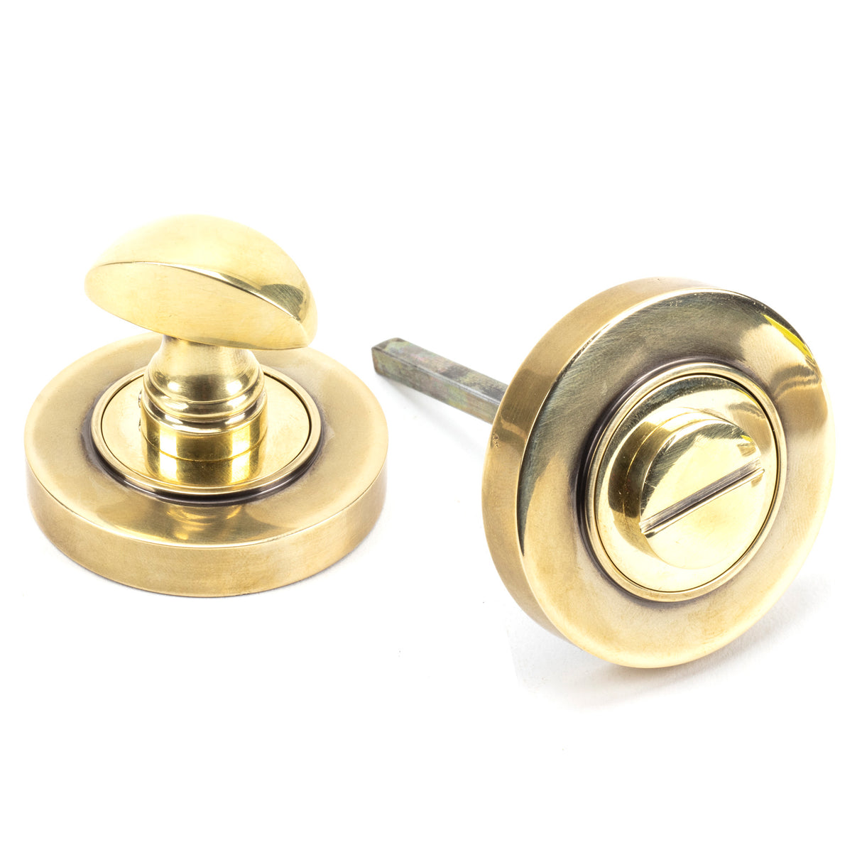 From The Anvil - Aged Brass Round Thumbturn Set (Plain) | Sku. 45731 | Trade Door Handles.