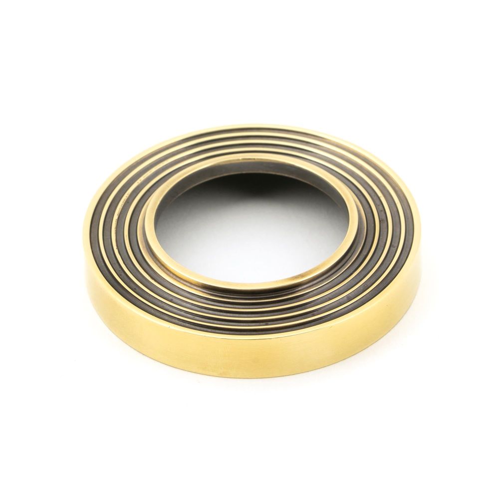 From The Anvil - Aged Brass Newbury Lever on Rose Set (Beehive) | Sku. 45757 | Trade Door Handles.