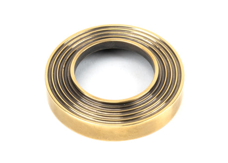 From The Anvil - Aged Brass Hammered Newbury Lever on Rose Set (Beehive) | Sku. 46071 | Trade Door Handles.