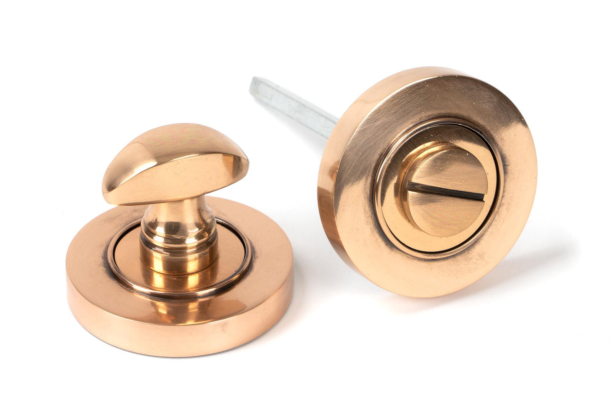 From The Anvil - Polished Bronze Round Thumbturn Set (Plain) | Sku. 46109 | Trade Door Handles.