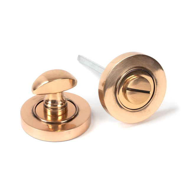 From The Anvil - Polished Bronze Round Thumbturn Set (Plain) | Sku. 46109 | Trade Door Handles.