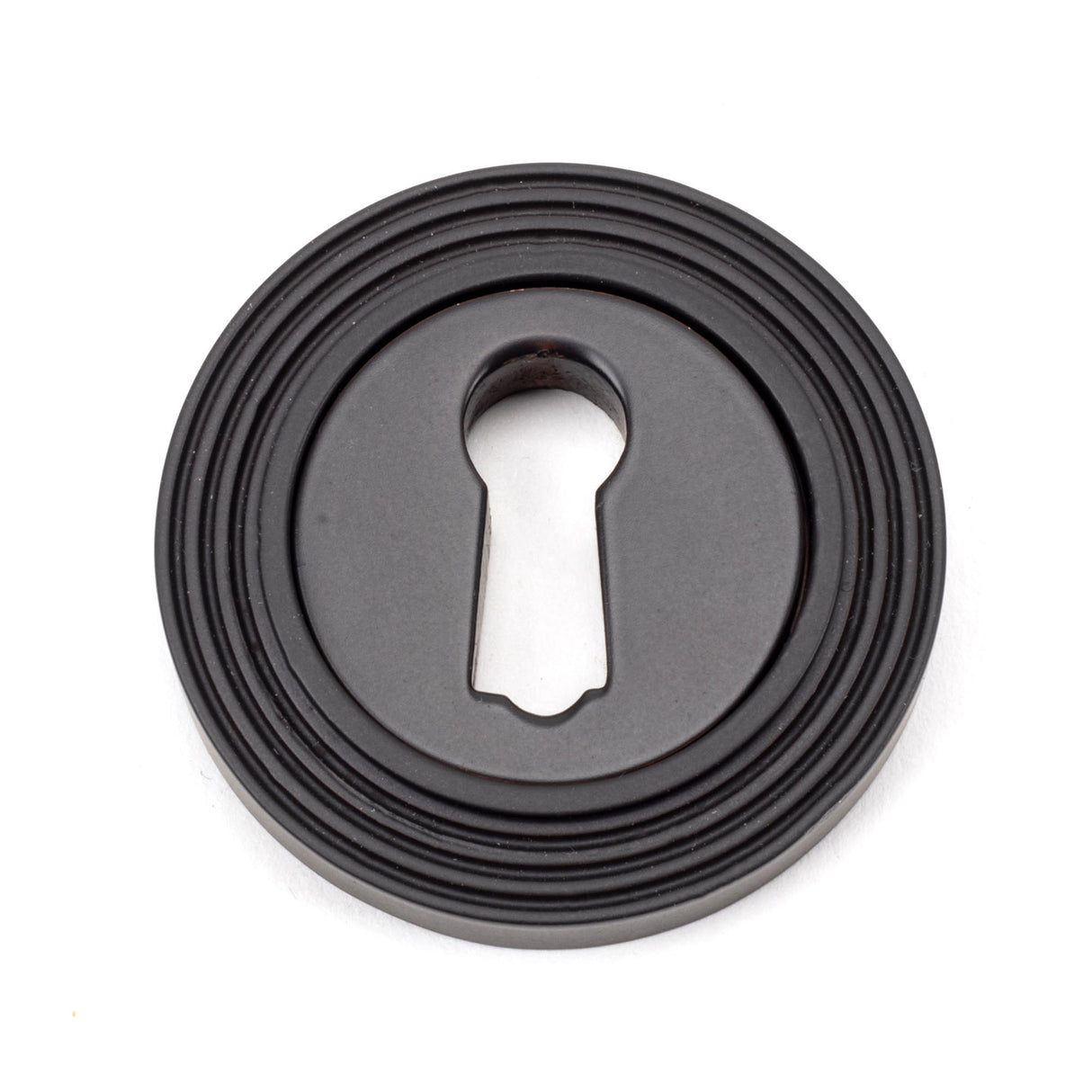 From The Anvil - Aged Bronze Round Escutcheon (Beehive) | Sku. 46115 | Trade Door Handles.