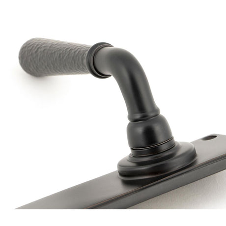 From The Anvil - Aged Bronze Hammered Newbury Lever Bathroom Set | Sku. 46223 | Trade Door Handles.