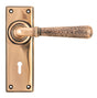 From The Anvil - Polished Bronze Hammered Newbury Lever Lock Set | Sku. 46225 | Trade Door Handles.