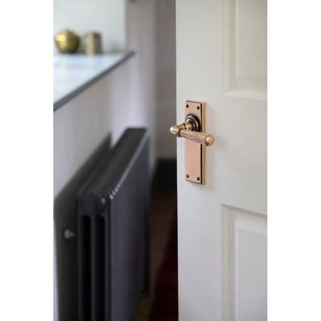 From The Anvil - Polished Bronze Hammered Newbury Lever Latch Set | Sku. 46226 | Trade Door Handles.