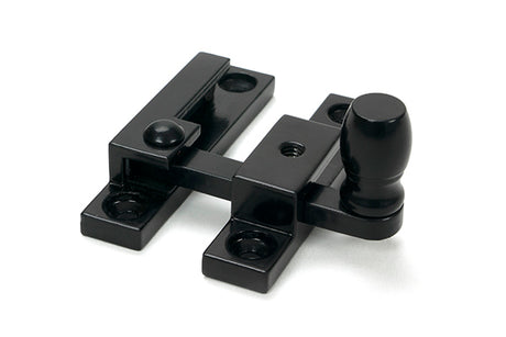 This is an image of From The Anvil - Black Mushroom Quadrant Fastener - Narrow available to order from Trade Door Handles in Kendal.