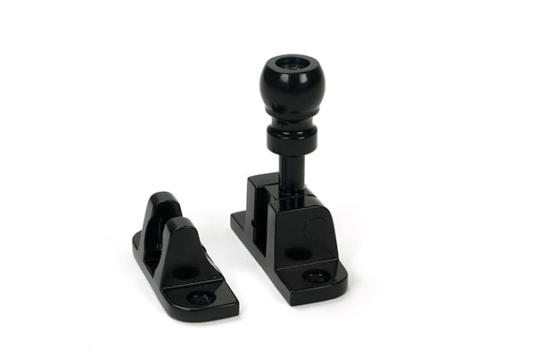 This is an image of From The Anvil - Black Mushroom Brighton Fastener (Radiused) available to order from Trade Door Handles in Kendal.