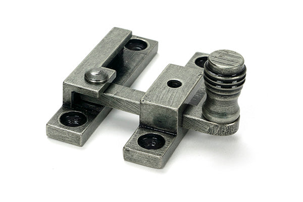 This is an image of From The Anvil - Pewter Prestbury Quadrant Fastener - Narrow available to order from Trade Door Handles in Kendal.