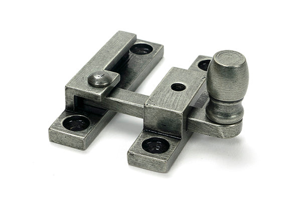 This is an image of From The Anvil - Pewter Mushroom Quadrant Fastener - Narrow available to order from Trade Door Handles in Kendal.