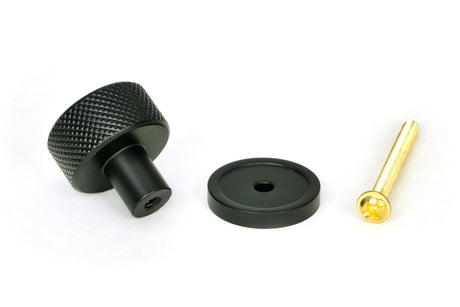 From The Anvil - Matt Black Brompton Cabinet Knob - 25mm (Plain) | Sku. 46838 | Trade Door Handles.