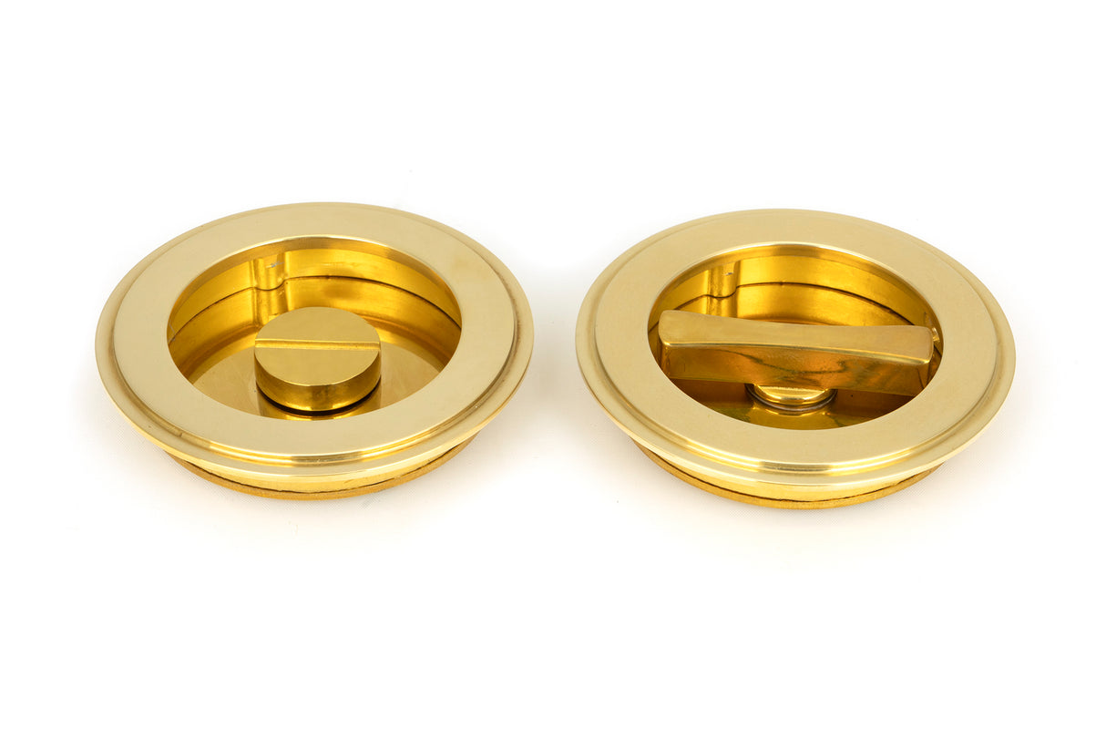 From The Anvil - Polished Brass 75mm Art Deco Round Pull - Privacy Set | Sku. 47170 | Trade Door Handles.