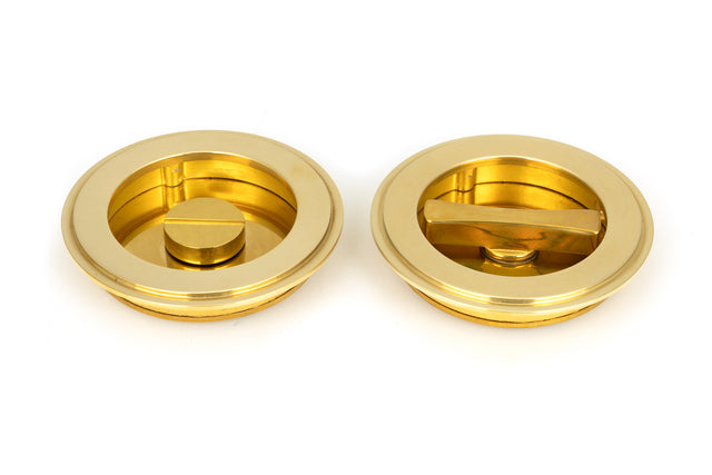 From The Anvil - Polished Brass 75mm Art Deco Round Pull - Privacy Set | Sku. 47170 | Trade Door Handles.