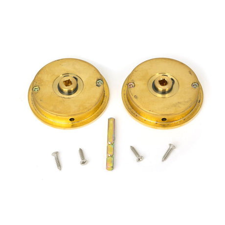 From The Anvil - Polished Brass 60mm Plain Round Pull - Privacy Set | Sku. 47171 | Trade Door Handles.