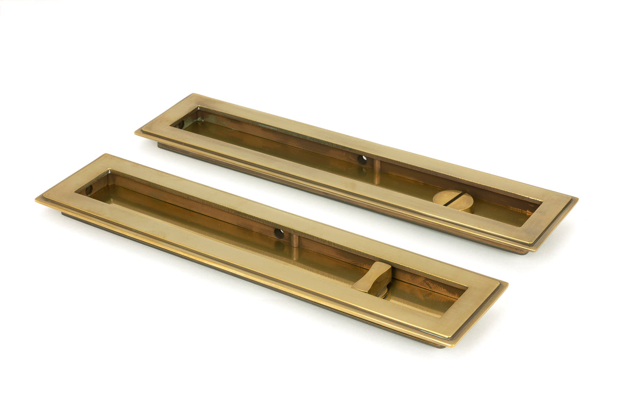 From The Anvil - Aged Brass 250mm Art Deco Rectangular Pull - Privacy Set | Sku. 48309 | Trade Door Handles.