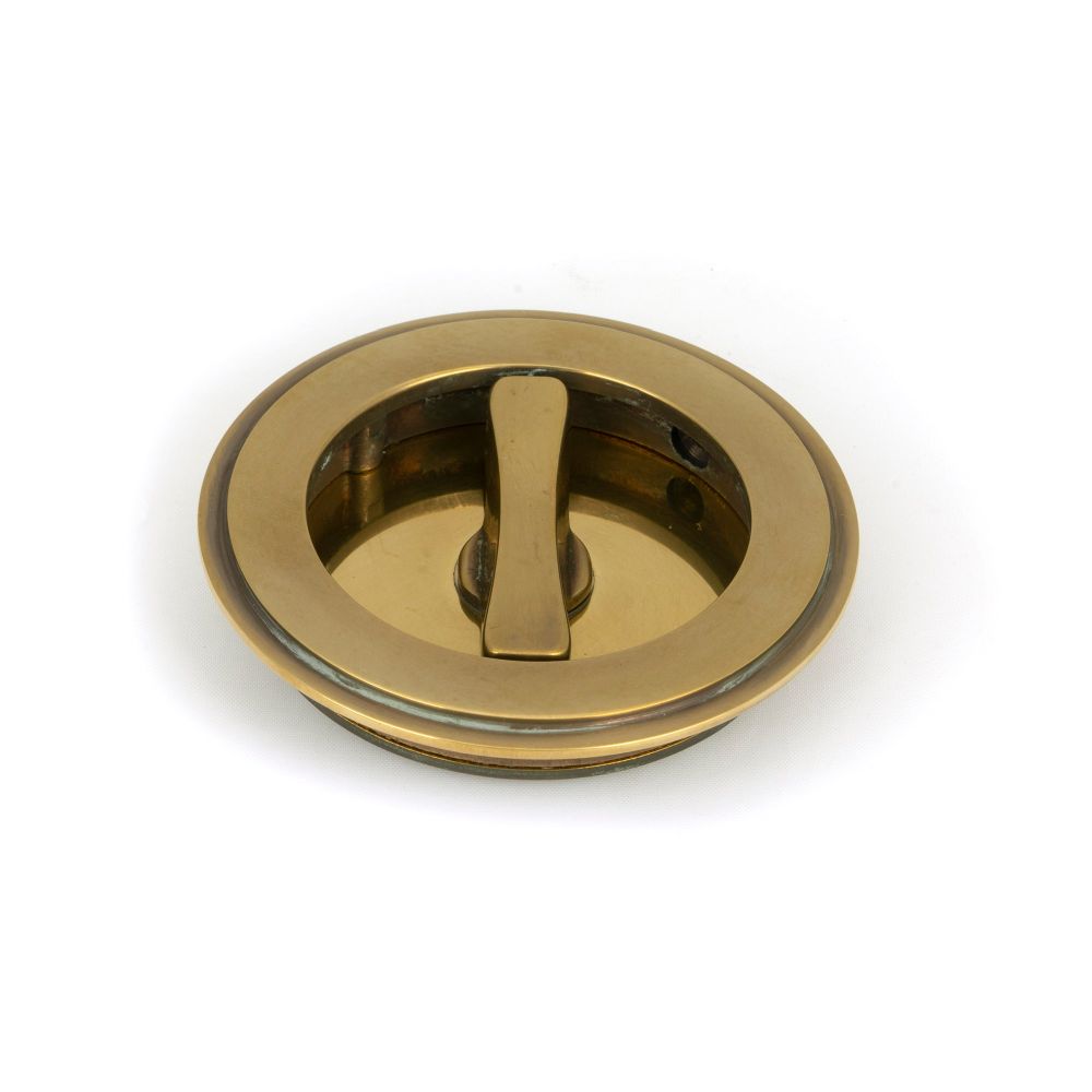 From The Anvil - Aged Brass 75mm Art Deco Round Pull - Privacy Set | Sku. 48325 | Trade Door Handles.