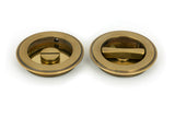 From The Anvil - Aged Brass 75mm Art Deco Round Pull - Privacy Set | Sku. 48325 | Trade Door Handles.
