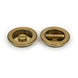 From The Anvil - Aged Brass 75mm Art Deco Round Pull - Privacy Set | Sku. 48325 | Trade Door Handles.