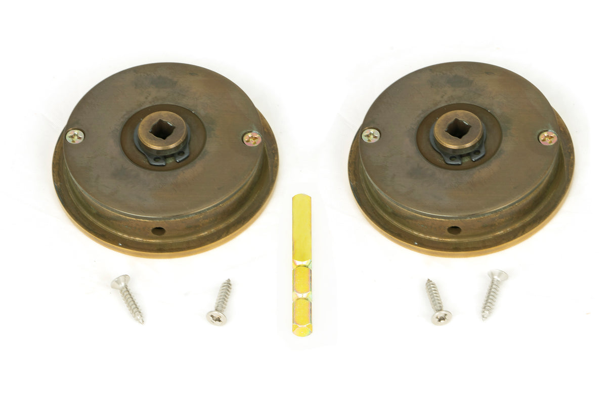 From The Anvil - Aged Brass 60mm Plain Round Pull - Privacy Set | Sku. 48330 | Trade Door Handles.