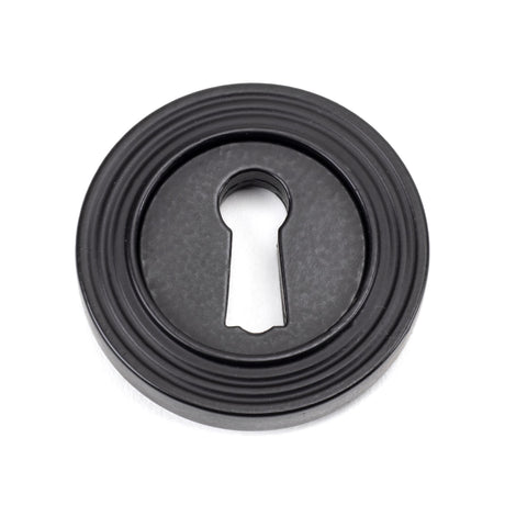 From The Anvil - Matt Black Round Escutcheon (Beehive) | Sku. 49538 | Trade Door Handles.