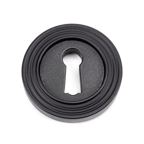 From The Anvil - Matt Black Round Escutcheon (Beehive) | Sku. 49538 | Trade Door Handles.