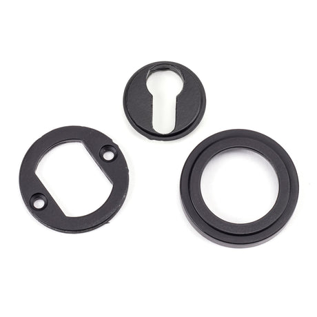 From The Anvil - Matt Black Round Euro Escutcheon (Art Deco) | Sku. 49541 | Trade Door Handles.