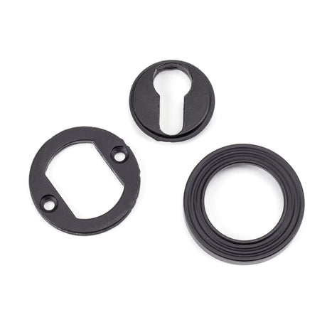 From The Anvil - Matt Black Round Euro Escutcheon (Beehive) | Sku. 49542 | Trade Door Handles.